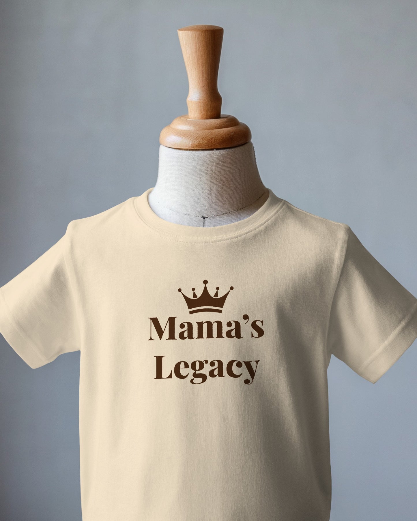 Toddler T-shirt with "Mama’s Legacy" and small crown graphic on soft cotton fabric
